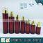 Cylinder RED coloured glass cosmetics bottles and face cream jars