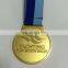 irregular hexagon shape gold medal with sparkle texture background as running medal