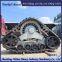 Modification of herringbone rubber track half chain rail harvester
