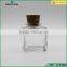 empty square glass food storage jar with cork