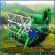 Crawler type mini grain harvester with driver seat