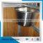 drinking bucket and feeder available Indoor bamboo filled horse stable