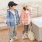 The manufacturer directly supplies the new product of the cold shield boy and girl pure color hooded children's down jacket