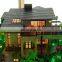 Small house model with warm light effect, architectural maquette