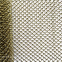 écran en tissage spiralé décoratif en acier inoxydable extensible et grillagé expansé. Maillage spiralé décoratif pour architecture