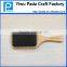 Wooden hair brush with plastic comb