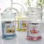 Colorful jelly candles in clear glass with decoration flower for wholesale