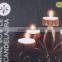 Romantic novelty design fashion black metal wine bottle candelabra/best seller wedding candlestick/ economic candle holder
