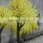 Yellow silk cherry blossom tree with artificial flower