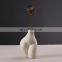 Modern Decorative Handmade Art Porcelain Matte White Creative Body Shape Pot Irregular Flower Ceramic Vase Nordic