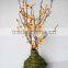 plum artificial flower in vase