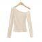 Camisa de manga larga tipo T con cuello inclinado brillante y sin hombros, de estilo europeo y estadounidense, nueva y a la moda para chicas, de ajuste irregular, para mujeres