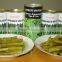 Green asparagus spears in tins and in jars