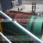Pulp mill trommel screen for waste paper recycling