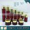 Cylinder RED coloured glass cosmetics bottles and face cream jars