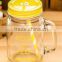18 ounce mason jar with handle and plastic lid and straw