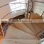 Helical Stairs with Wood Treads and metal railing curved wood staircase