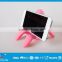 Promotion gifts multipurpose cute funny human shaped silicone mobile phone holder
