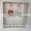 pierced pop up display with shelf board