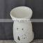 Hot sale porcelain white Christmas T-light oil burner with hollow design