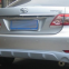 The Toyota Corolla car is surrounded by a 11-13 Carora front and rear spoiler skirt