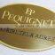 Metal gold name plate with company logo