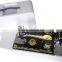 Household sewing machine with handle and plastic box