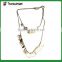 Golden metal chain necklace with faux pearls and alloy triangles