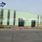 Qingdao H section structural steel construction hall warehouse buildings for sale