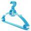 multi colored plastic rotating clothes hanger rack