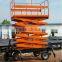 Movable hydraulic driven motorcycle scissor lift table