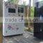 Coin operated ice cream vending machine