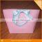 Pink color recyclable shopping bags brown paper bag