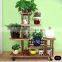 China factory wholesale antique wooden plant stand with wheels