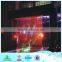 Glass water wall fountain, with digital logo or light