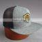 custom 5 panel trucker cap with woven badge
