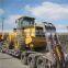 Японский погрузчик на колесах Caterpillar 966H осуществляет погрузку, фронтальный погрузчик CAT 966H отправляется в порт
