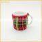 High quality ceramic mug with knitted sleeve cover