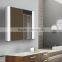 Lighted cabinet with double sided mirror doors for modern hotel bathroom