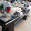 Double-head precision cutting saw for aluminum window profile
