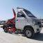 Hook arm garbage truck