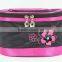 Compact tubby black and pink cosmetic bag, professional zippered design