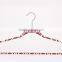 thin velvet plastic hanger with logo