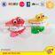 Plastic wind up teeth with rose promotional jumping teeth toys for kids