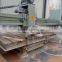 Laser bridge saw for stone cutting