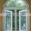 aluminum side hung casement window with half round spoked pediment
