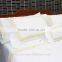 Gold lotus flowers embroidered bedding set with hemstitch