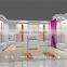 Indian clothing stores display showcase and wooden kiosk for cell phone accessories