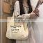 Eco-friendly wholesale heavy bearing thick black color shoulder women hand bags canvas bag with custom printed logo