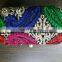 Sequence embroidery designer clutch